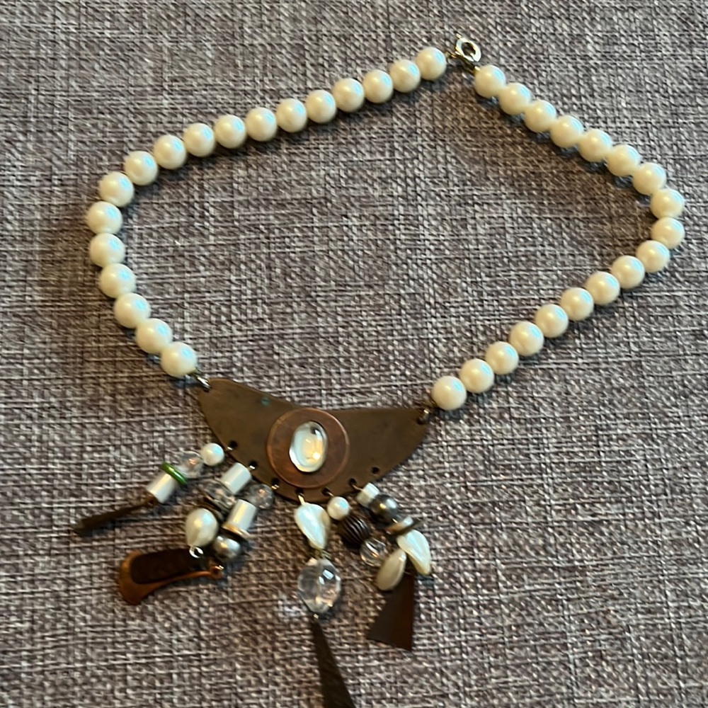 ***FREE WITH PURCHASE***.      Unique statement necklace.